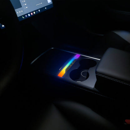 Tesla Voice-activated streaming ambient light charging extension port.